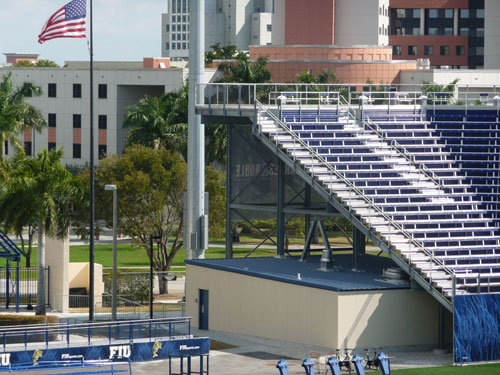 Bleachers beside an American flag